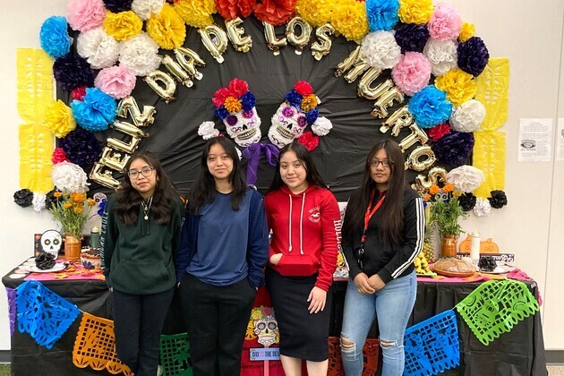 Southwest Middle High School - Academia Bilingüe juniors Maria Gonzalez, Juana Rafael, Lucresia Francisco, Anabel Vargas (left to right) created an altar for their school for Day of the Dead or Día de los Muertos.