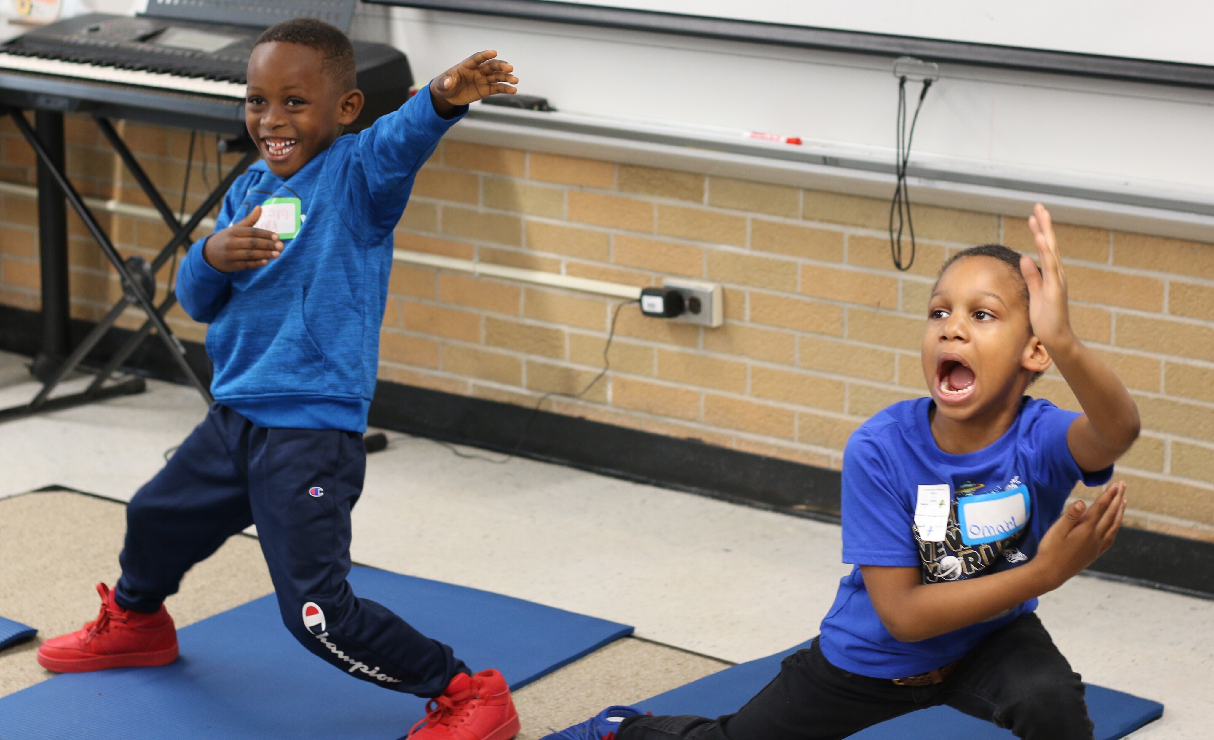 A yoga station as part of the wellness education activities was a big hit with scholars at Mulick Park Elementary