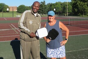 Kurt Johnson, GRPS Executive Director of Athletics & Dual Enrollment, and Lori Mann from the Grand Rapids Pickleball Club