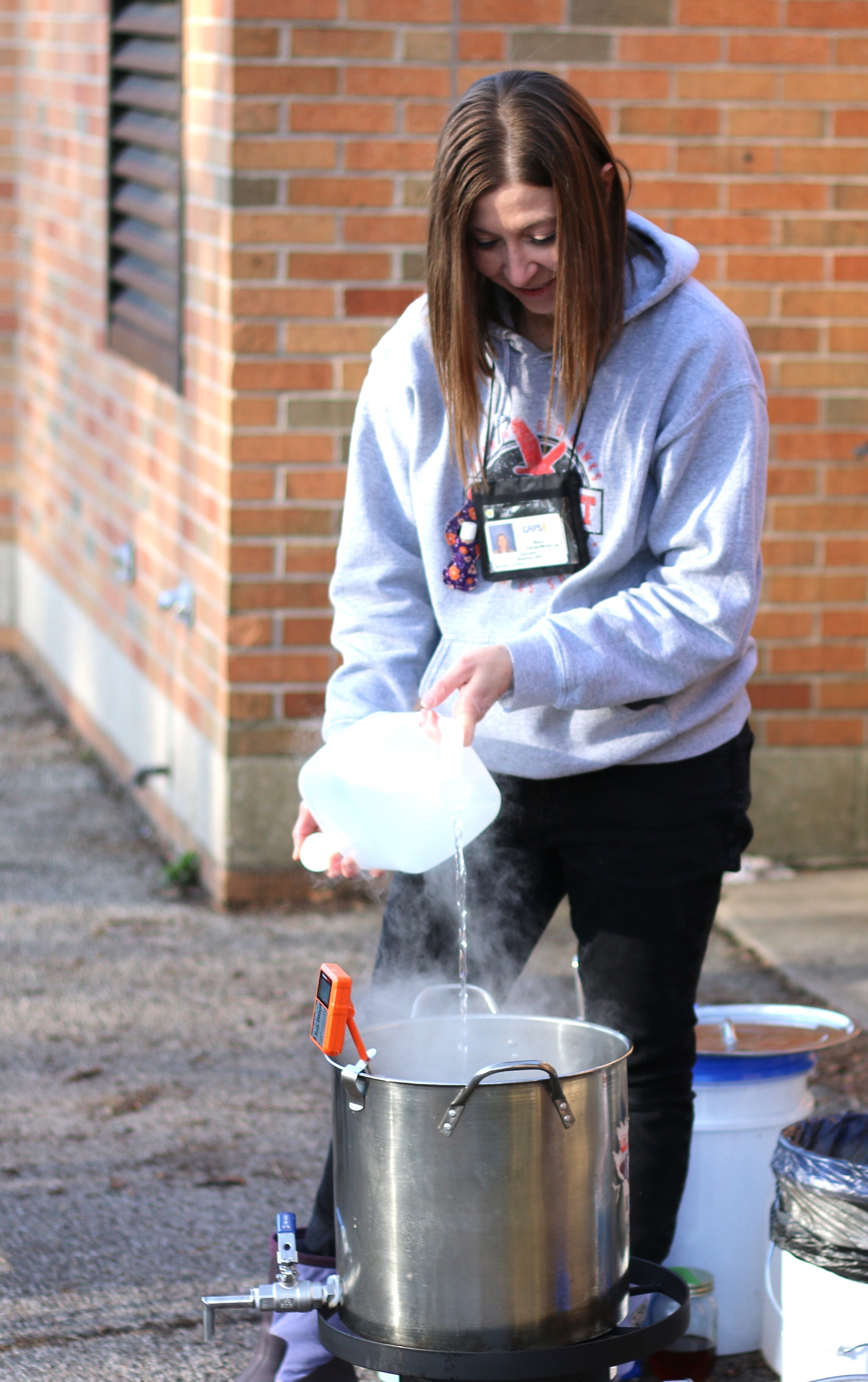 Adding sap as part of the boiling off process to create maple syrup