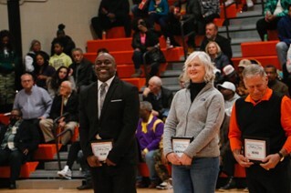 Eric Large and Brittina Williams after receiving their Hall of Fame plaque and walking across the court
